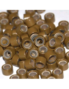 Anillas silicona rubio Osc. 100 ud KX